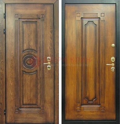 Коричневая металлическая дверь с массивом дуба с рисунком ДМД-10 в Петрозаводске