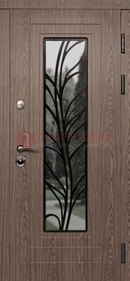 Металлическая дверь со стеклом и ковкой в стиле модерн ДСК-106 в Серпухове
