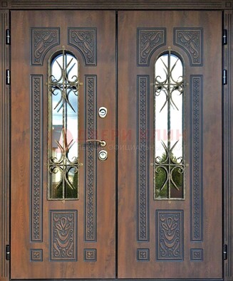 Двухстворчатая стальная дверь со стеклом и ковкой для дома ДСК-153 в Волхове
