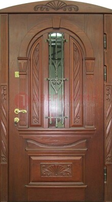 Узорная железная дверь массив со стеклом и ковкой ДСК-247 в Саратове